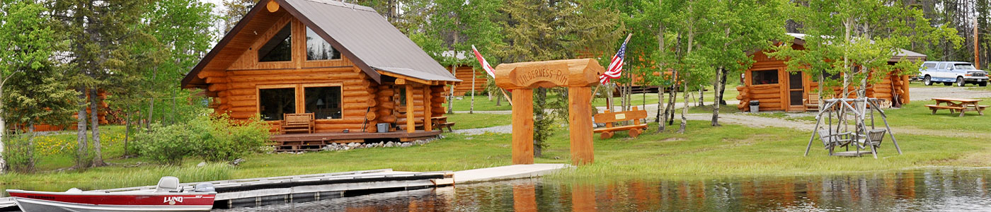 Header photo of Trumpeter cabin, dock gateway, fish house