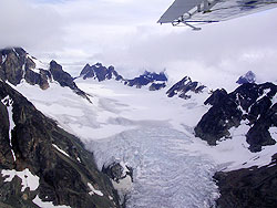 Photo courtesy of Miriam Schilling. A ring of peaks surround a bowl of ice that have carved them.